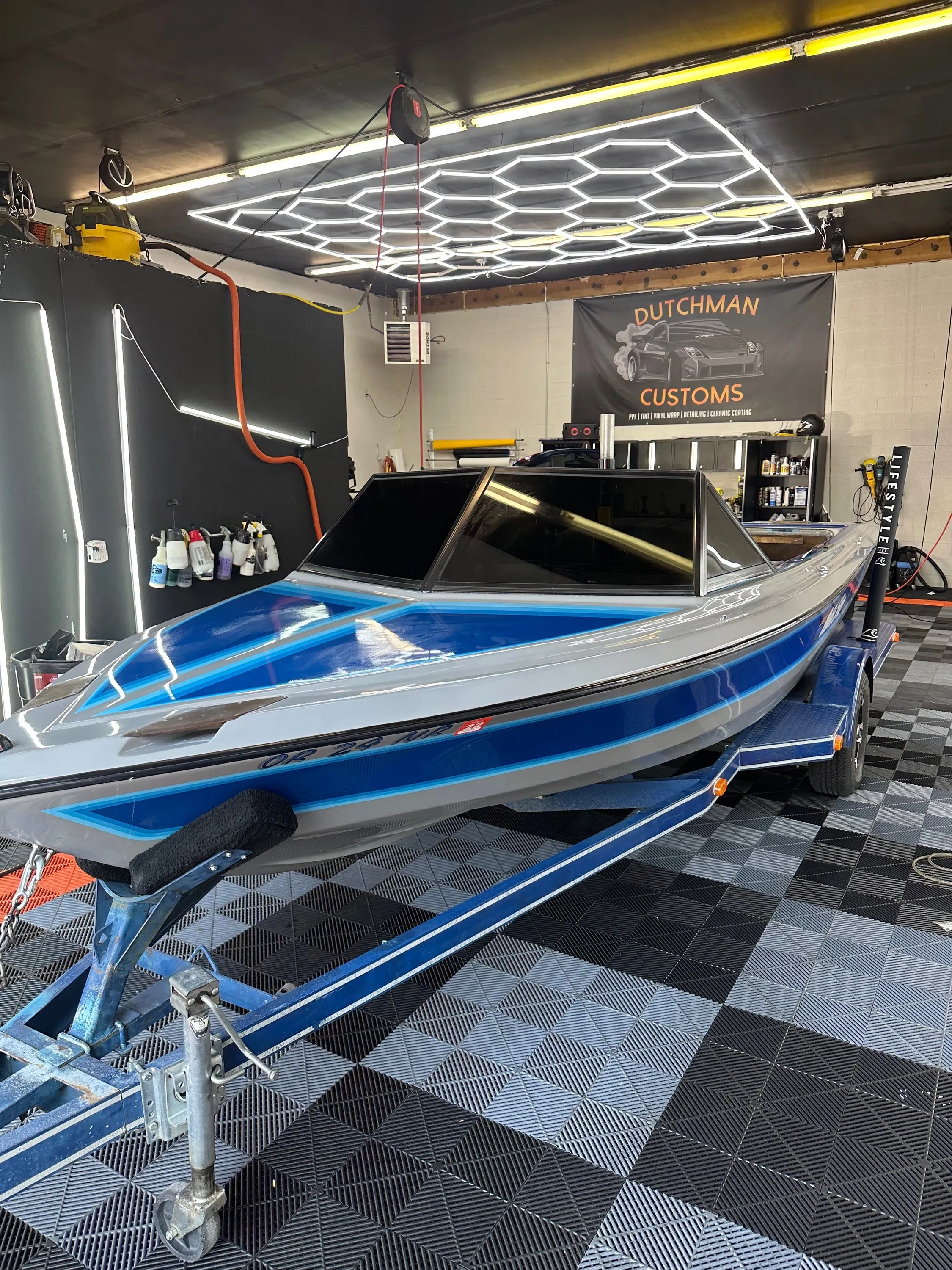 Ski boat on a trailer in the bay